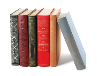 Stack of hardcover books on white background