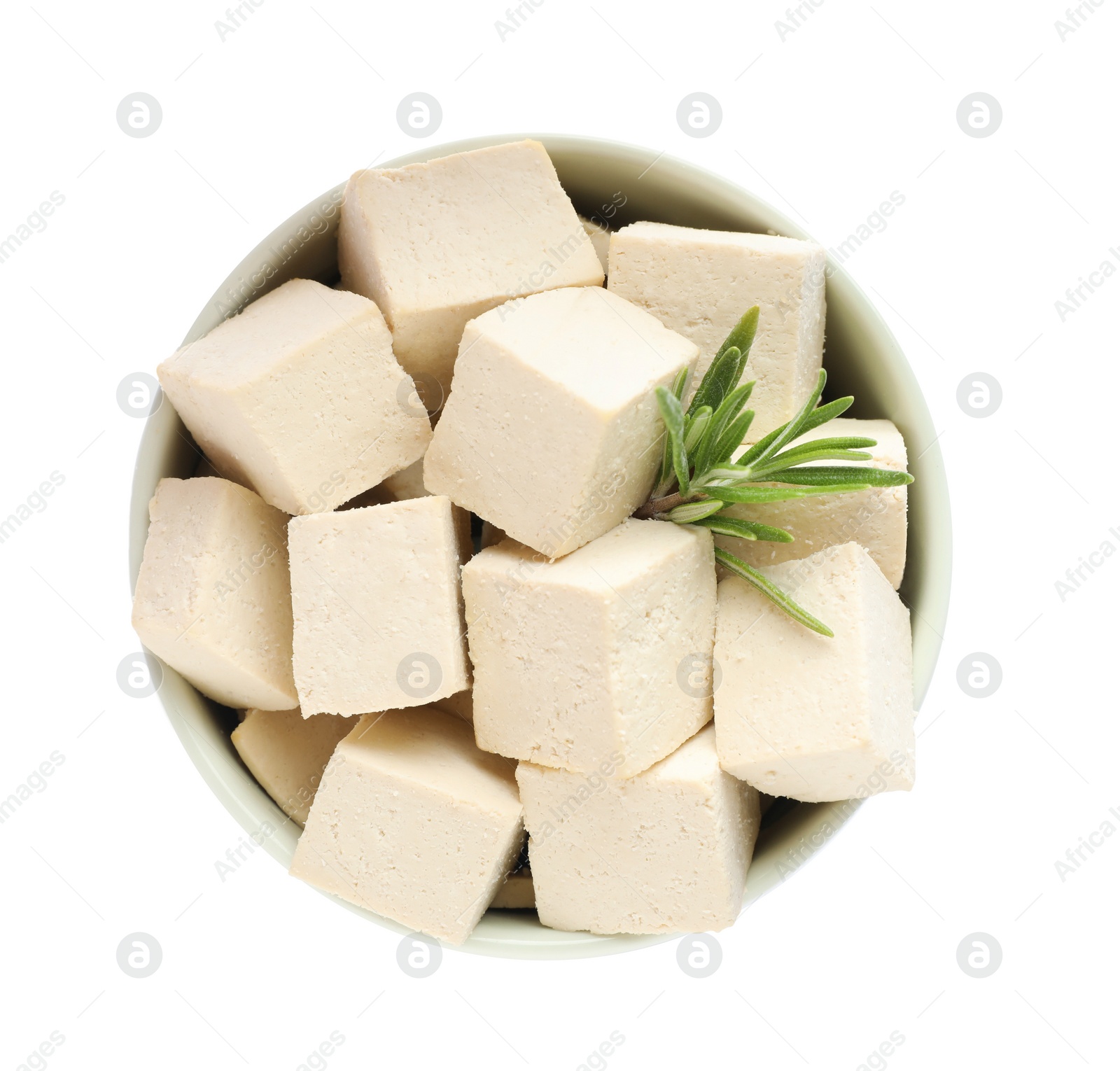 Photo of Bowl with delicious tofu and rosemary isolated on white, top view