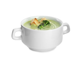 Delicious broccoli cream soup with croutons isolated on white