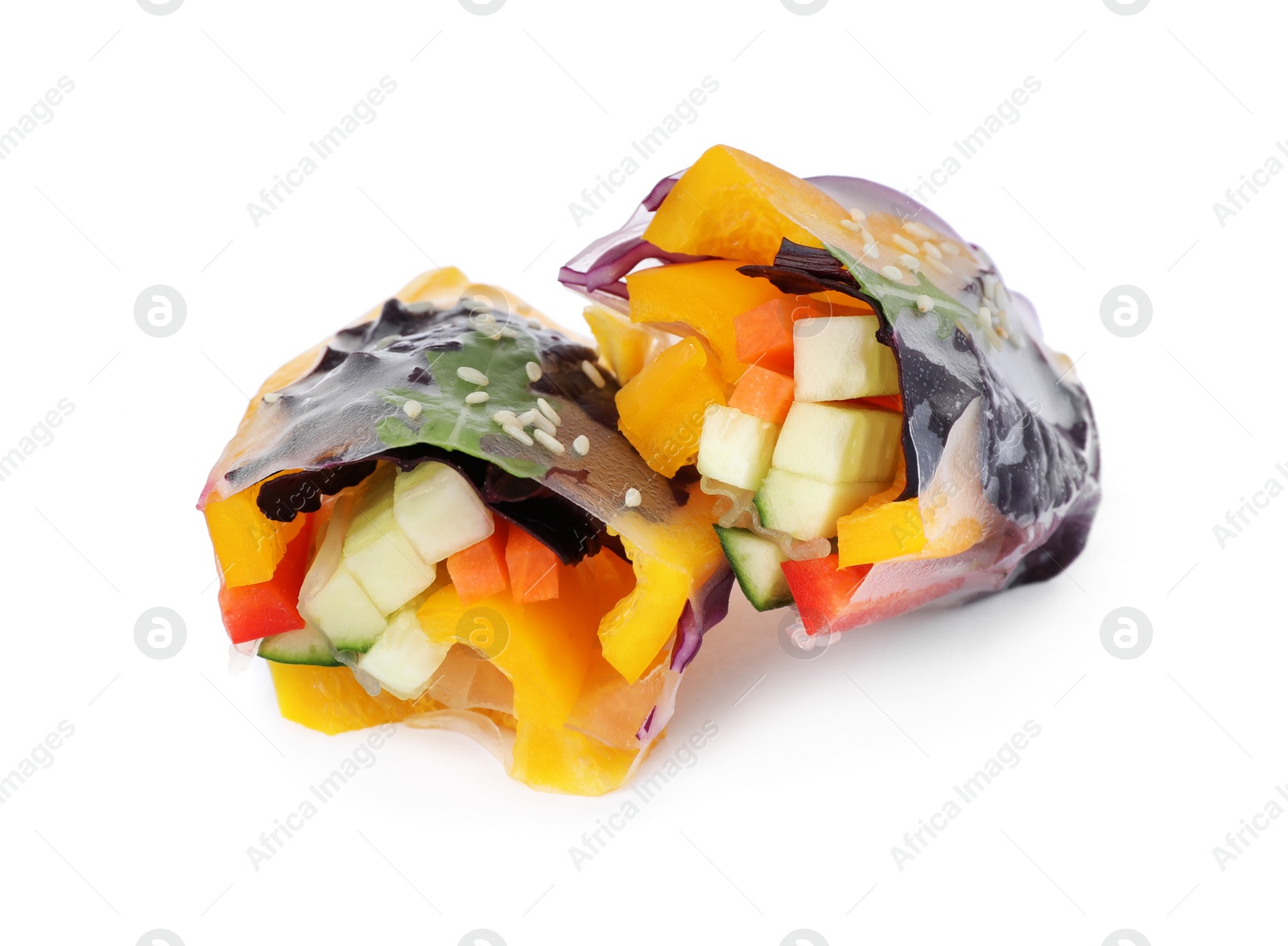 Photo of Delicious rolls wrapped in rice paper on white background, closeup
