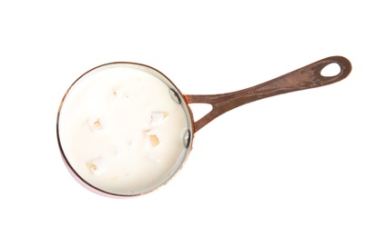 Photo of Delicious creamy sauce in pan on white background, top view