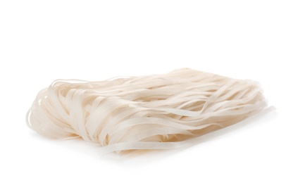 Photo of Raw rice noodles on white background. Delicious pasta