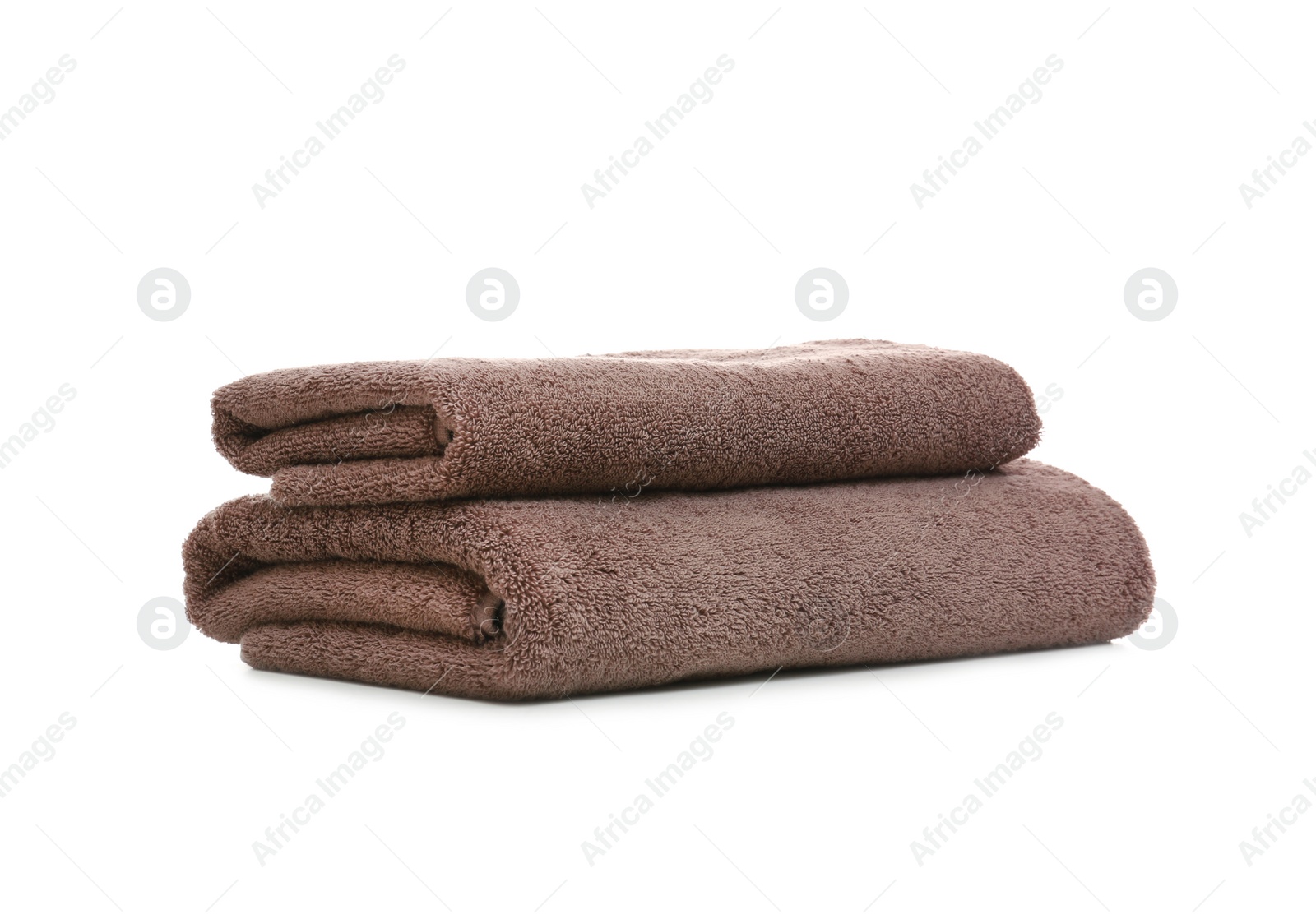 Photo of Clean color folded towels on white background