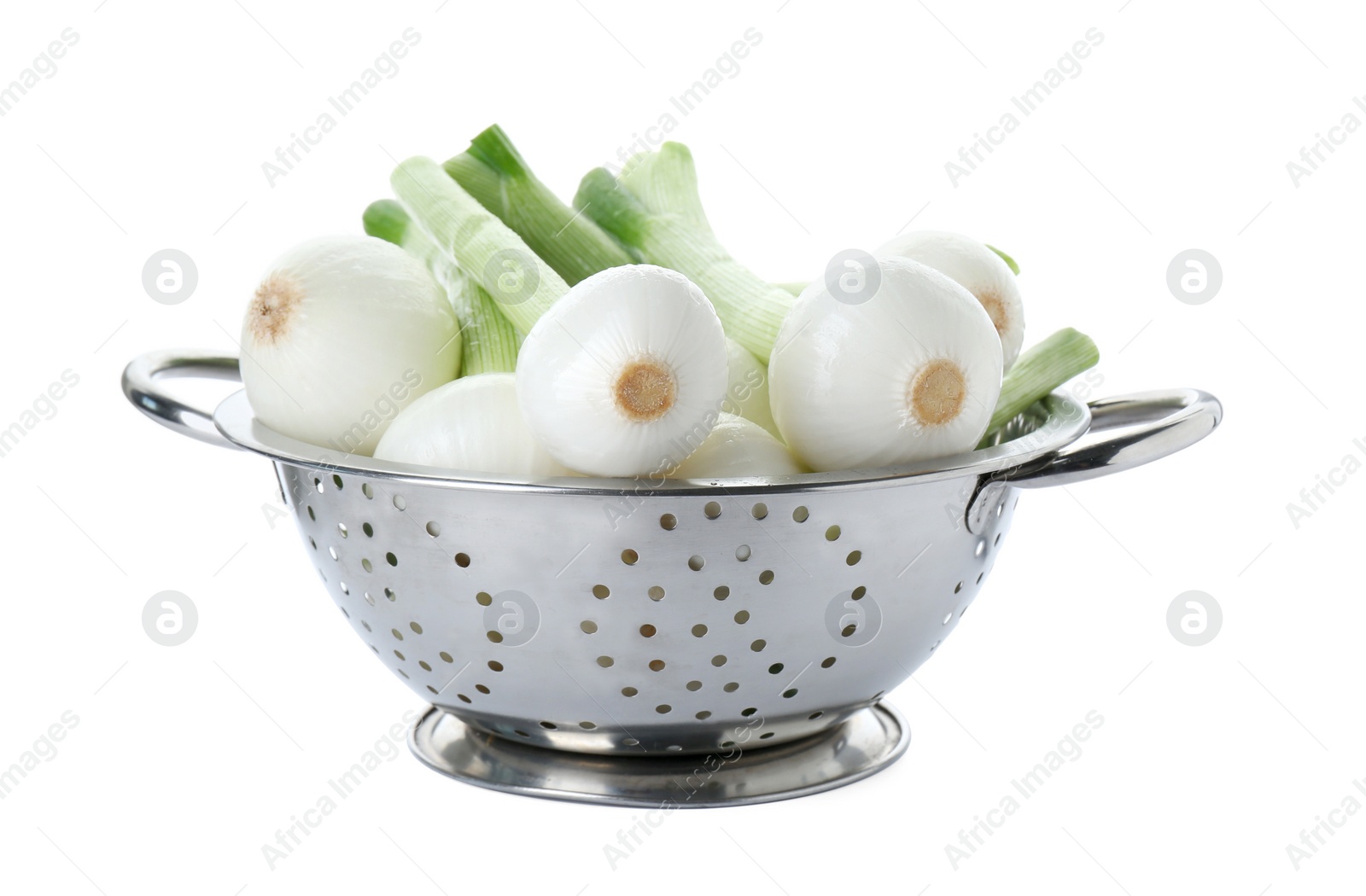 Photo of Colander with green spring onions isolated on white