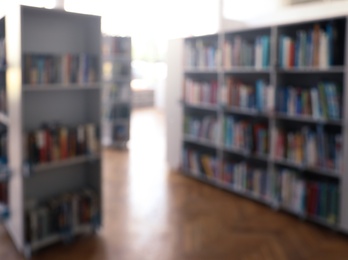 Blurred view of library interior with bookcases