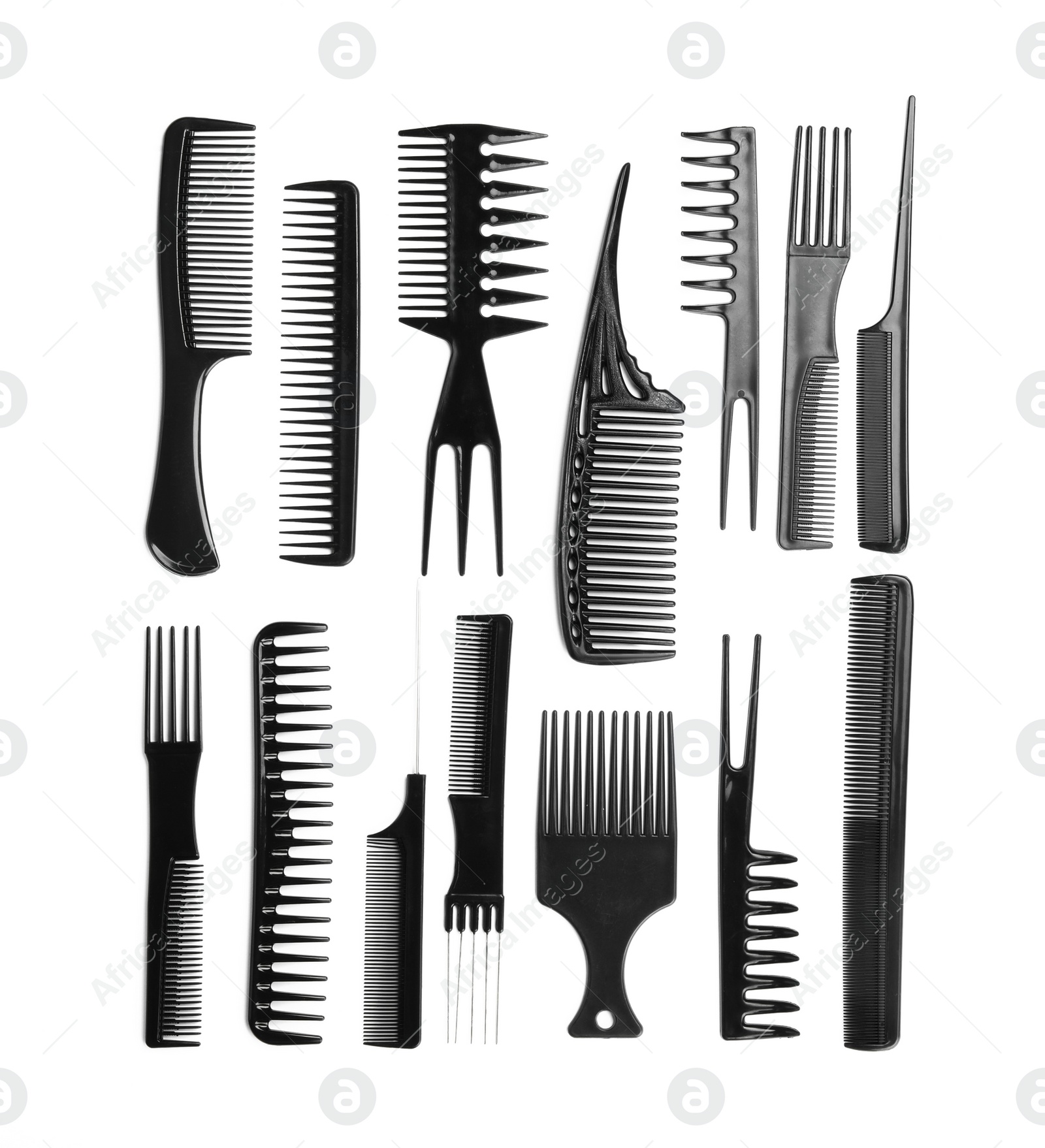 Photo of Set of modern hair combs isolated on white, top view