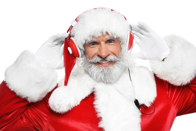 Photo of Santa Claus listening to Christmas music on white background