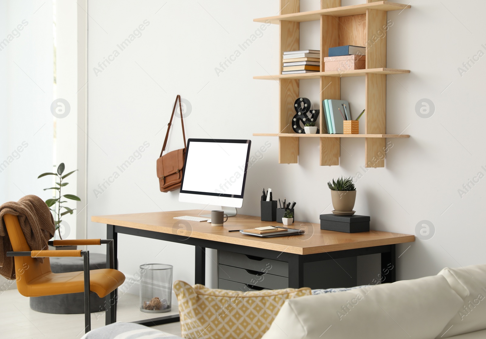 Photo of Stylish room interior with modern comfortable workplace