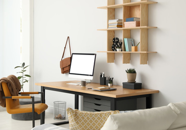 Stylish room interior with modern comfortable workplace