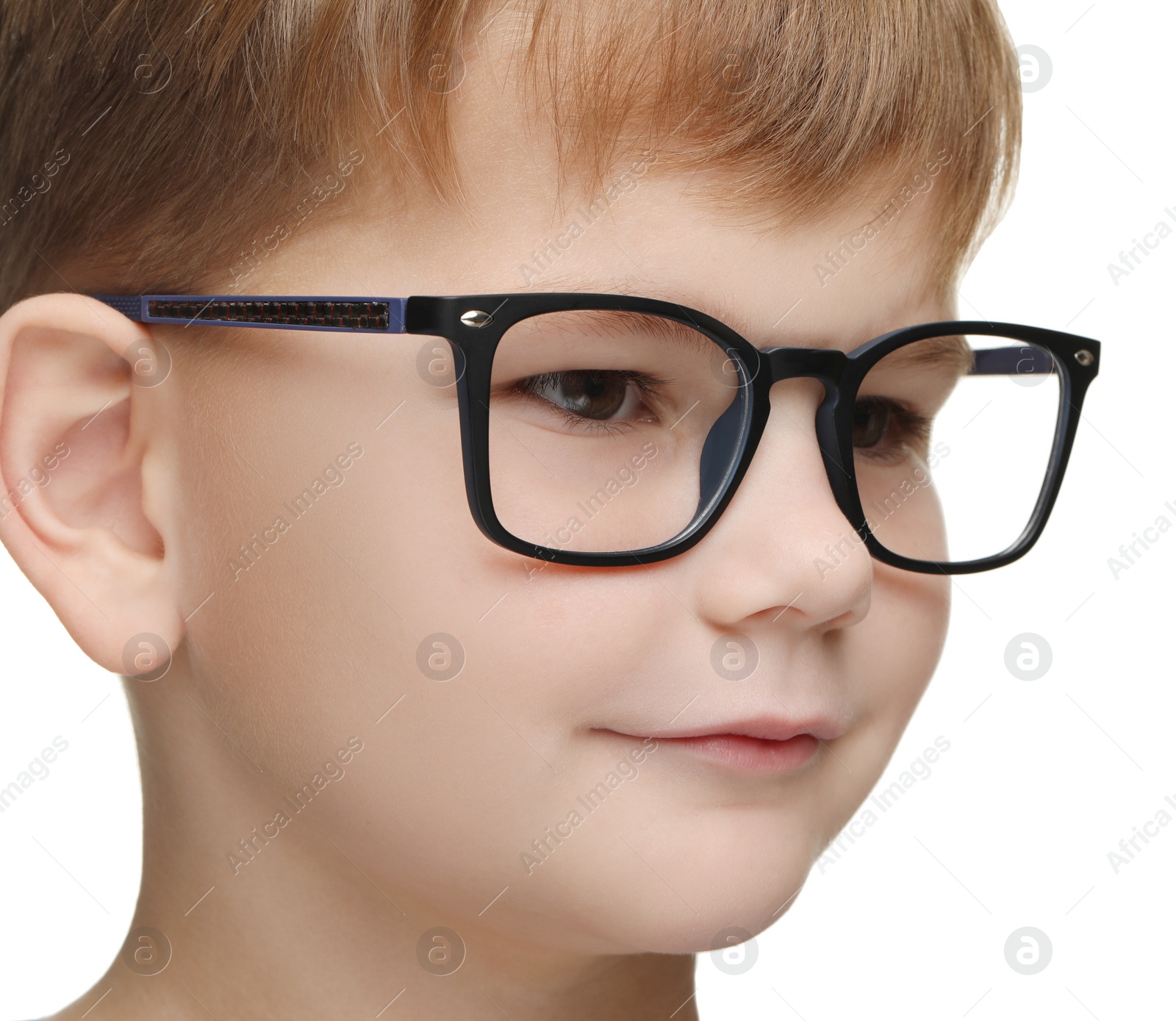 Photo of Little boy with glasses on white background, closeup