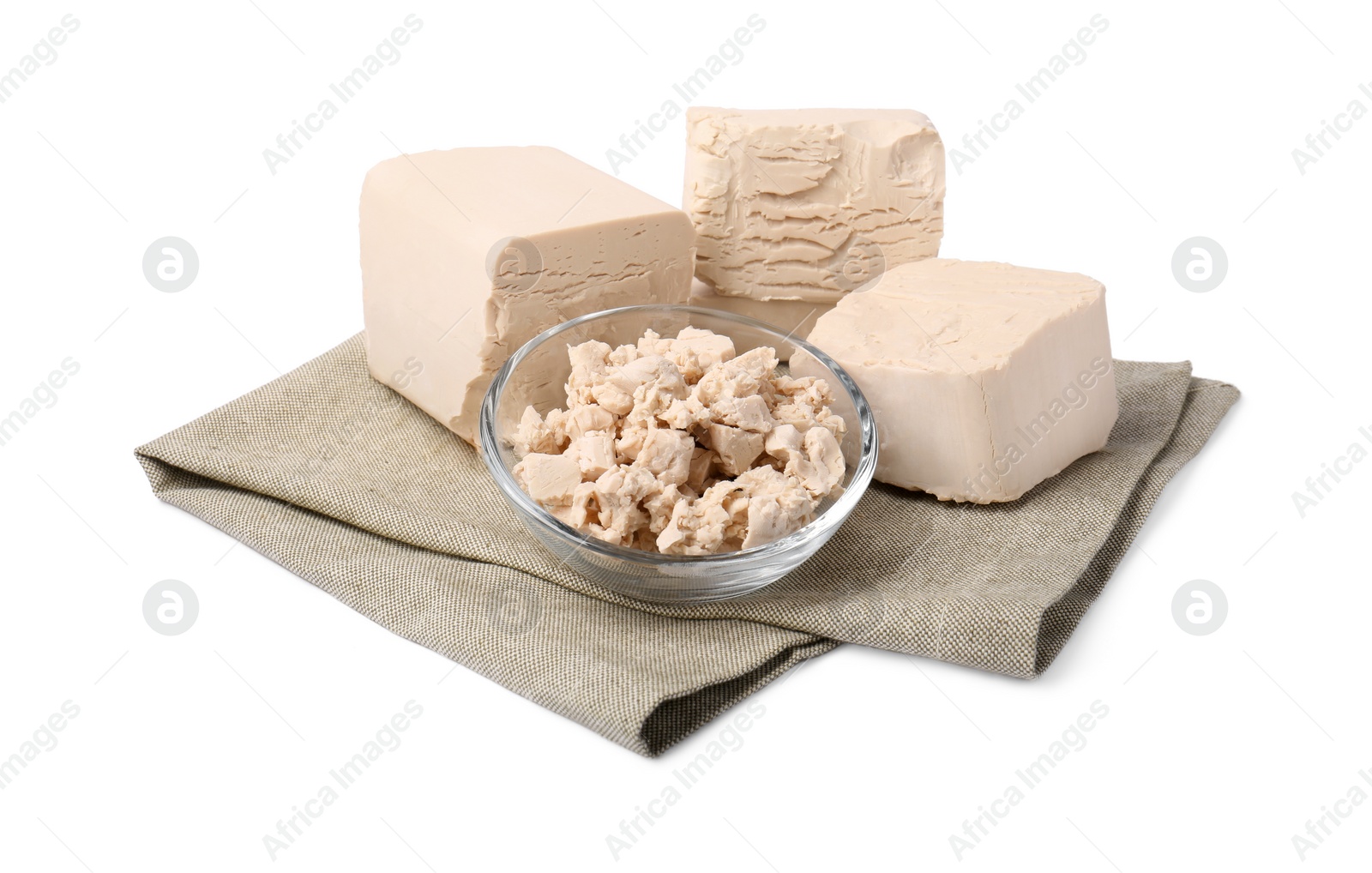 Photo of Pieces of compressed yeast isolated on white