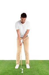 Photo of Young man playing golf on course against white background