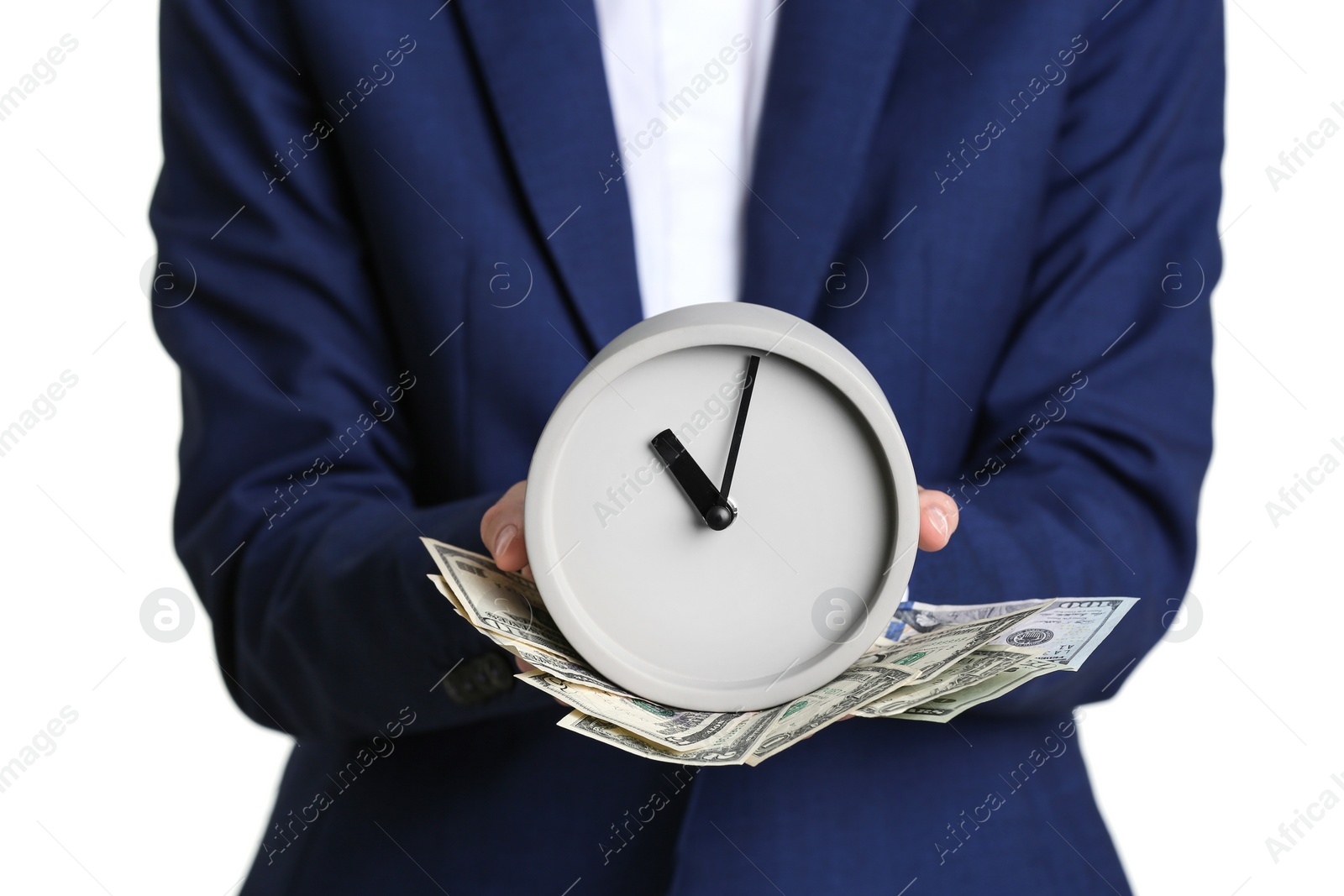 Photo of Businesswoman holding alarm clock and cash on white background. Time is money concept
