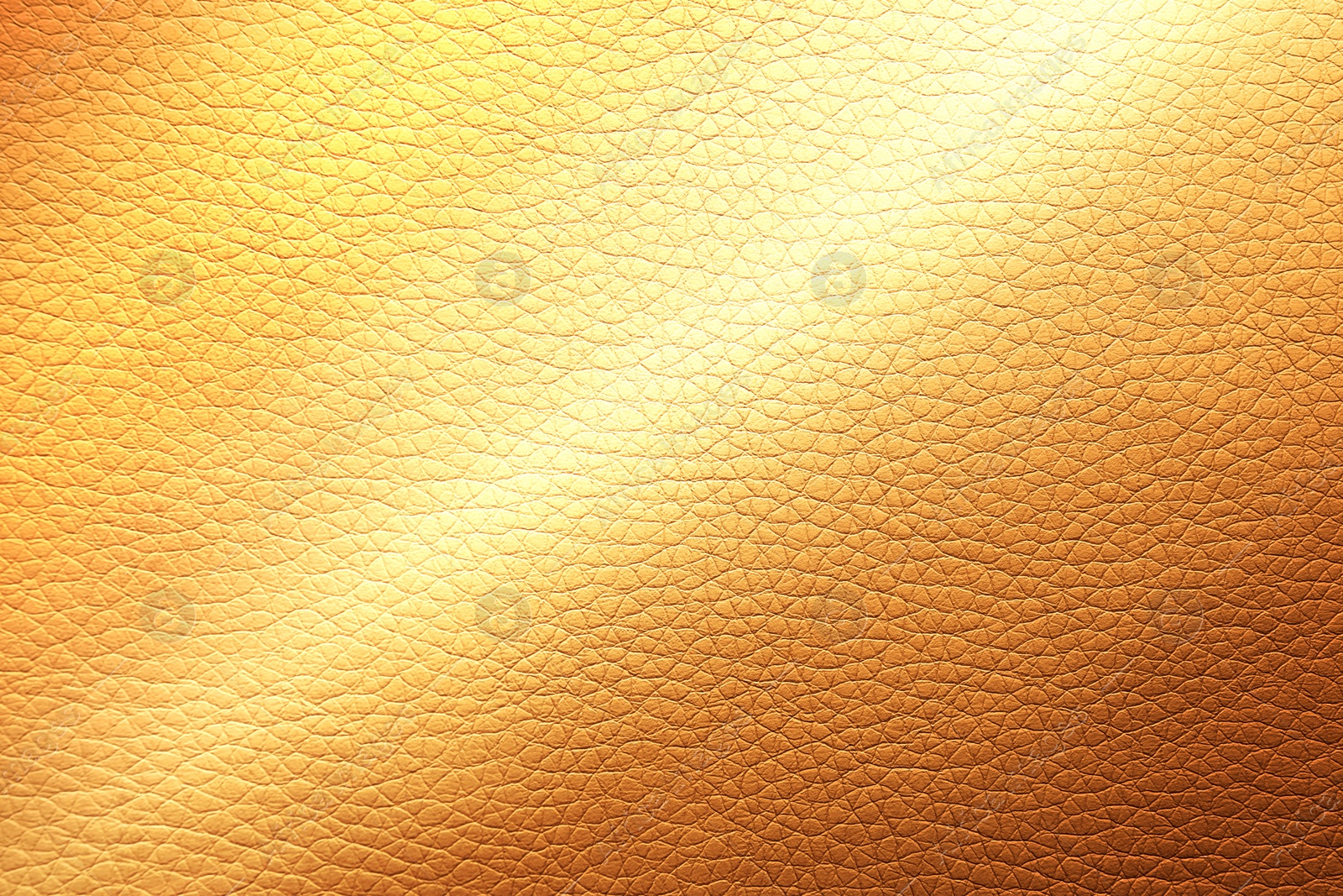 Image of Golden textured surface as background, closeup view