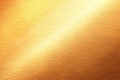 Image of Golden textured surface as background, closeup view