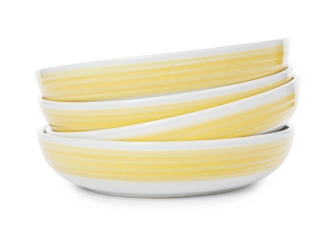 Photo of Stack of clean plates on white background. Washing dishes