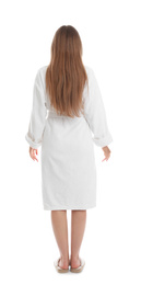 Young woman in bathrobe on white background