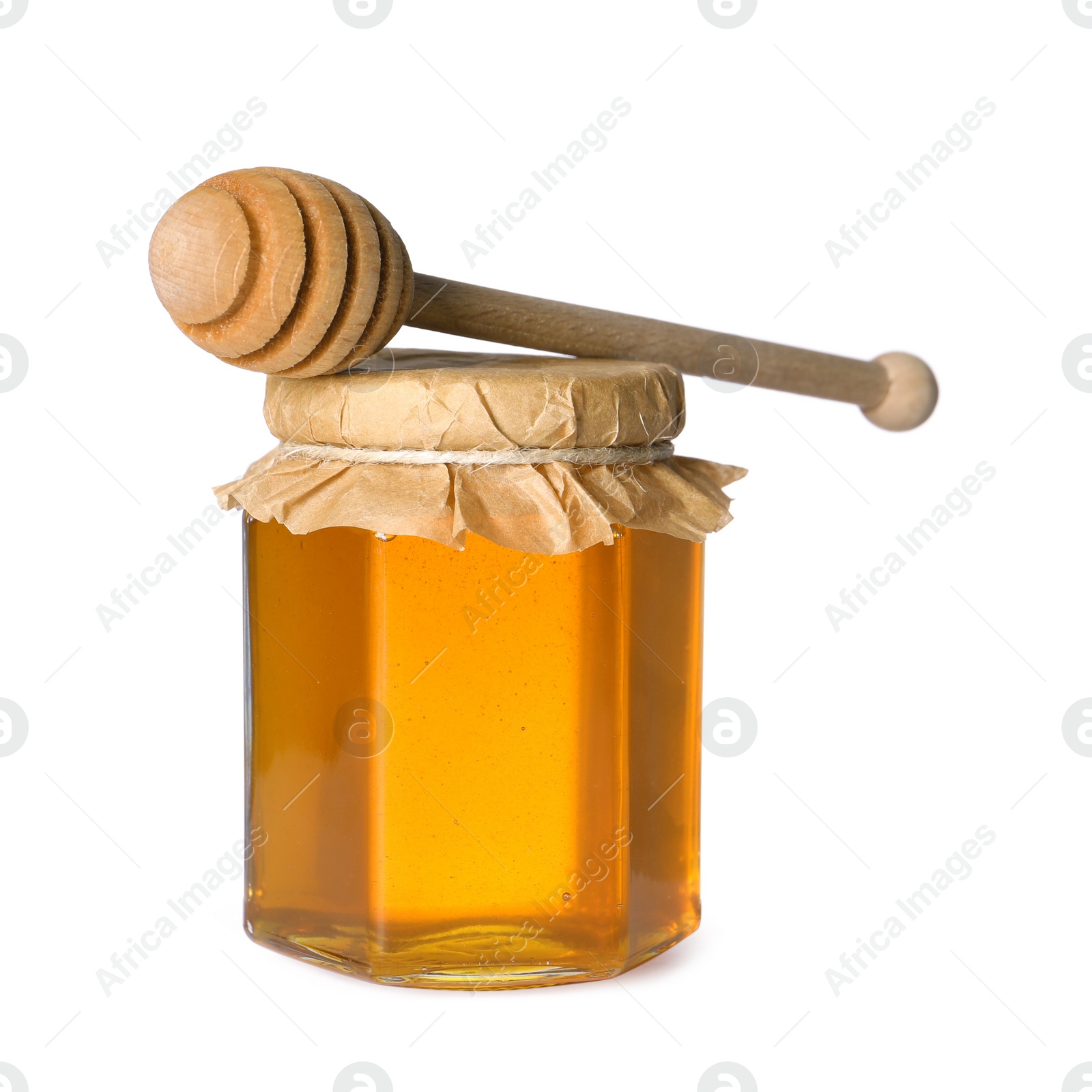 Photo of Tasty natural honey in glass jar and dipper isolated on white