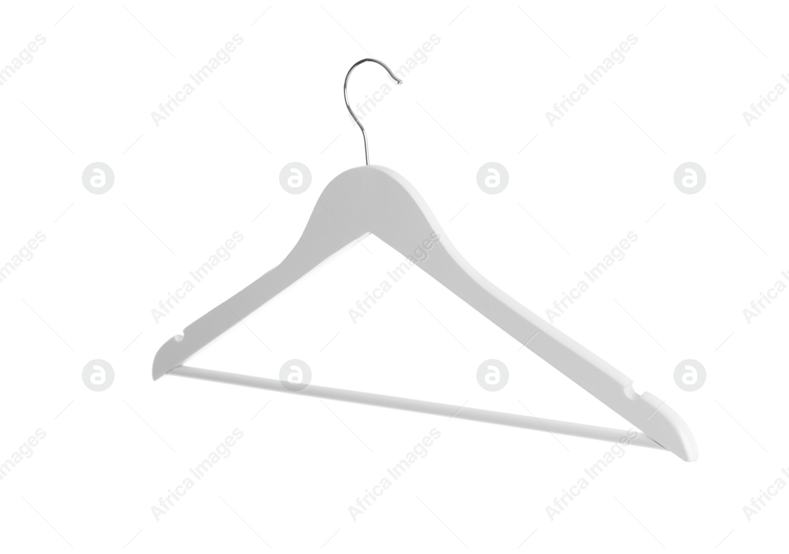 Photo of Empty hanger on white background. Wardrobe accessory