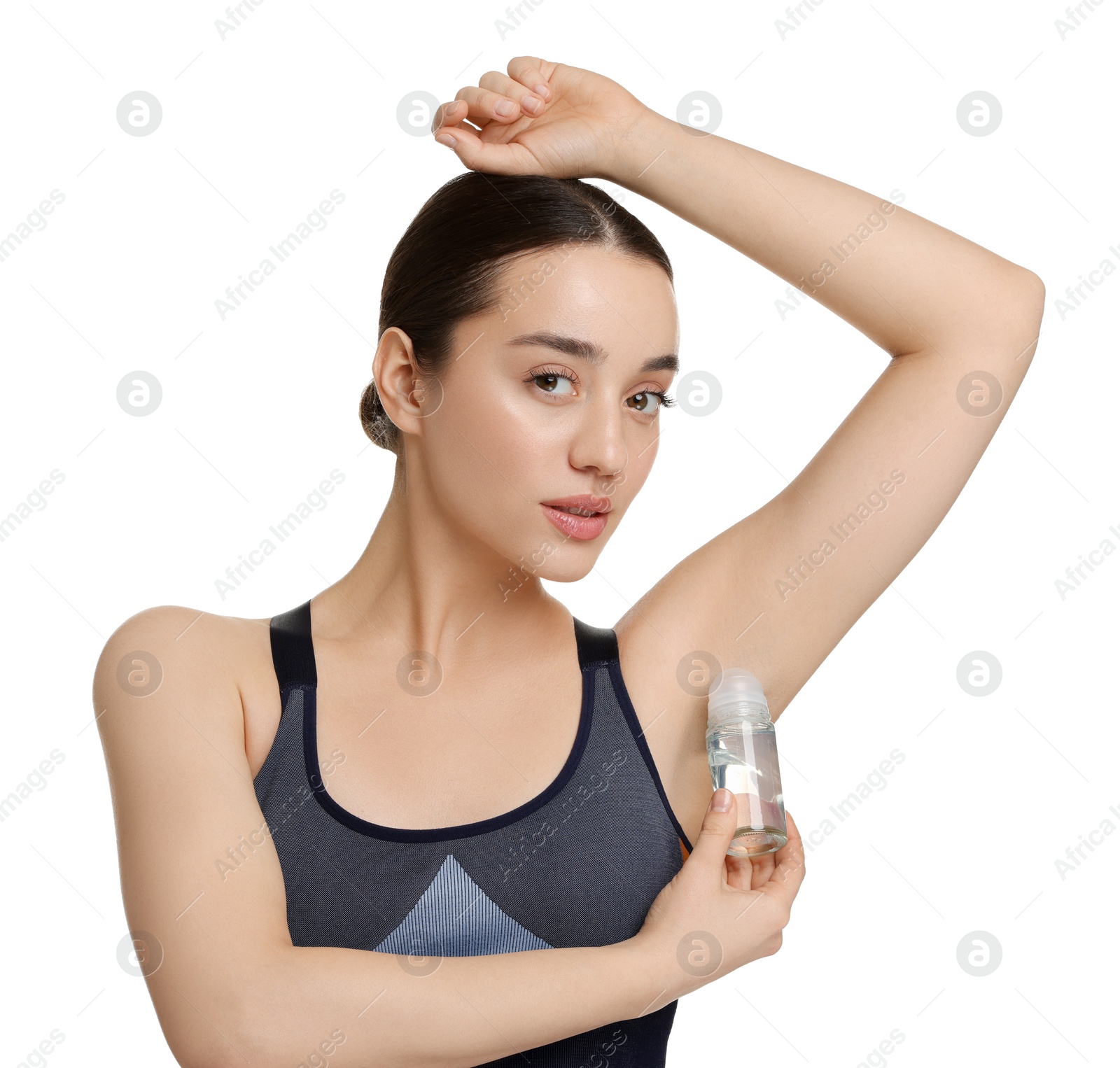 Photo of Beautiful woman applying deodorant on white background