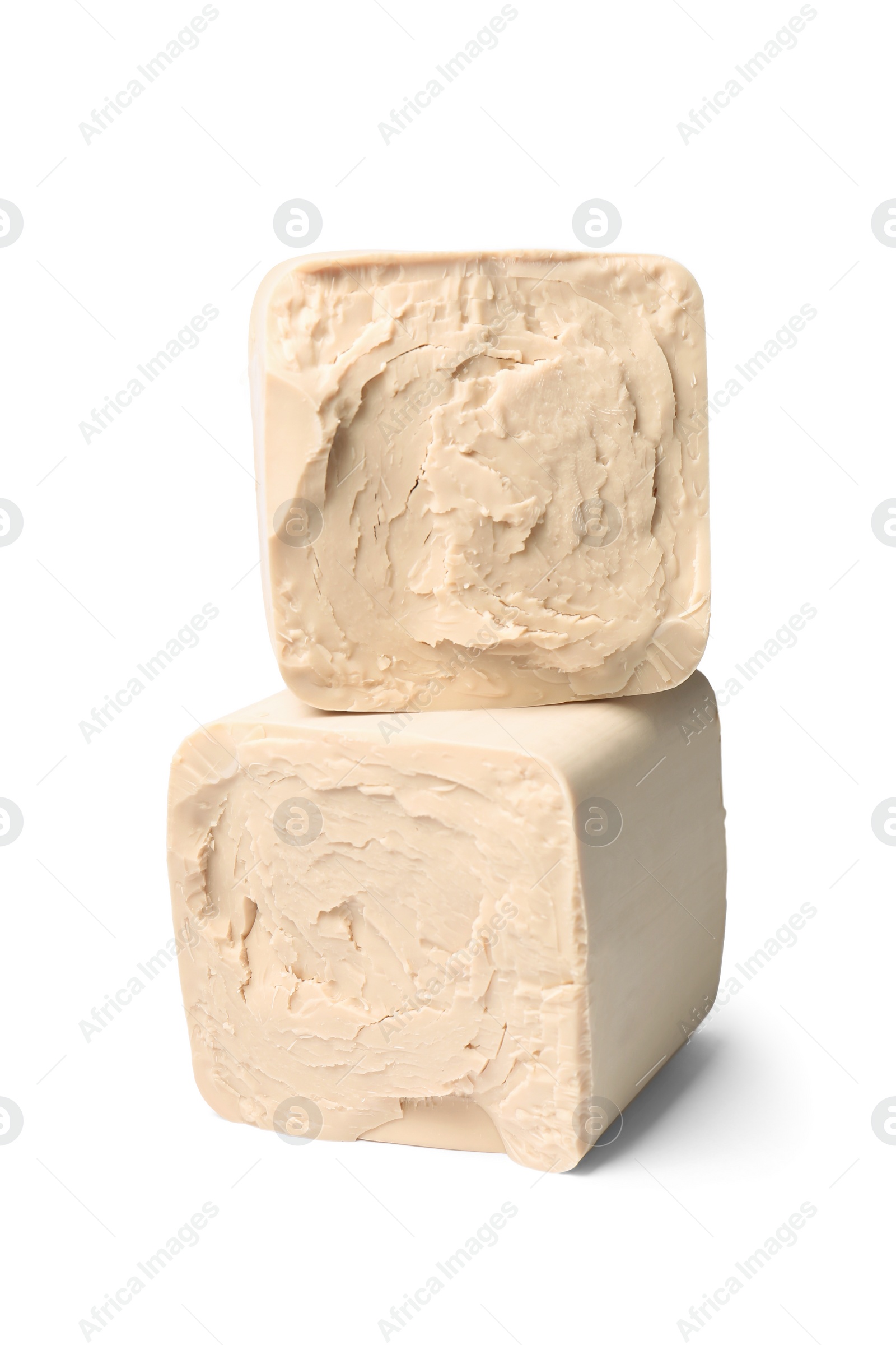 Photo of Blocks of compressed yeast isolated on white