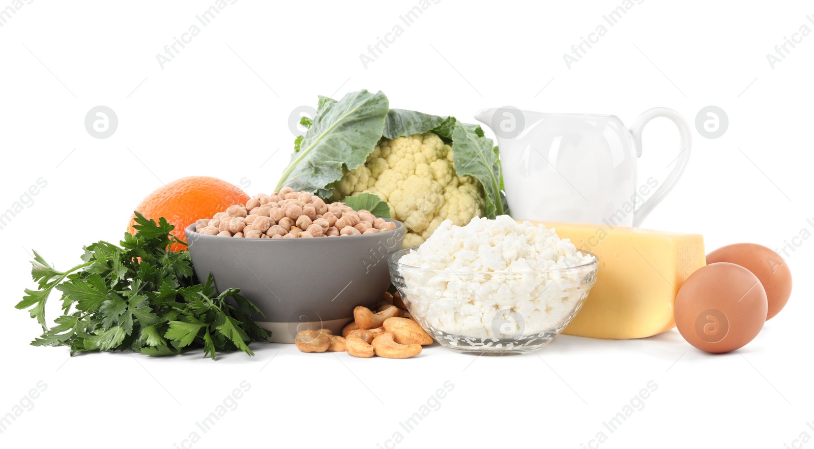 Photo of Set of natural food high in calcium on white background