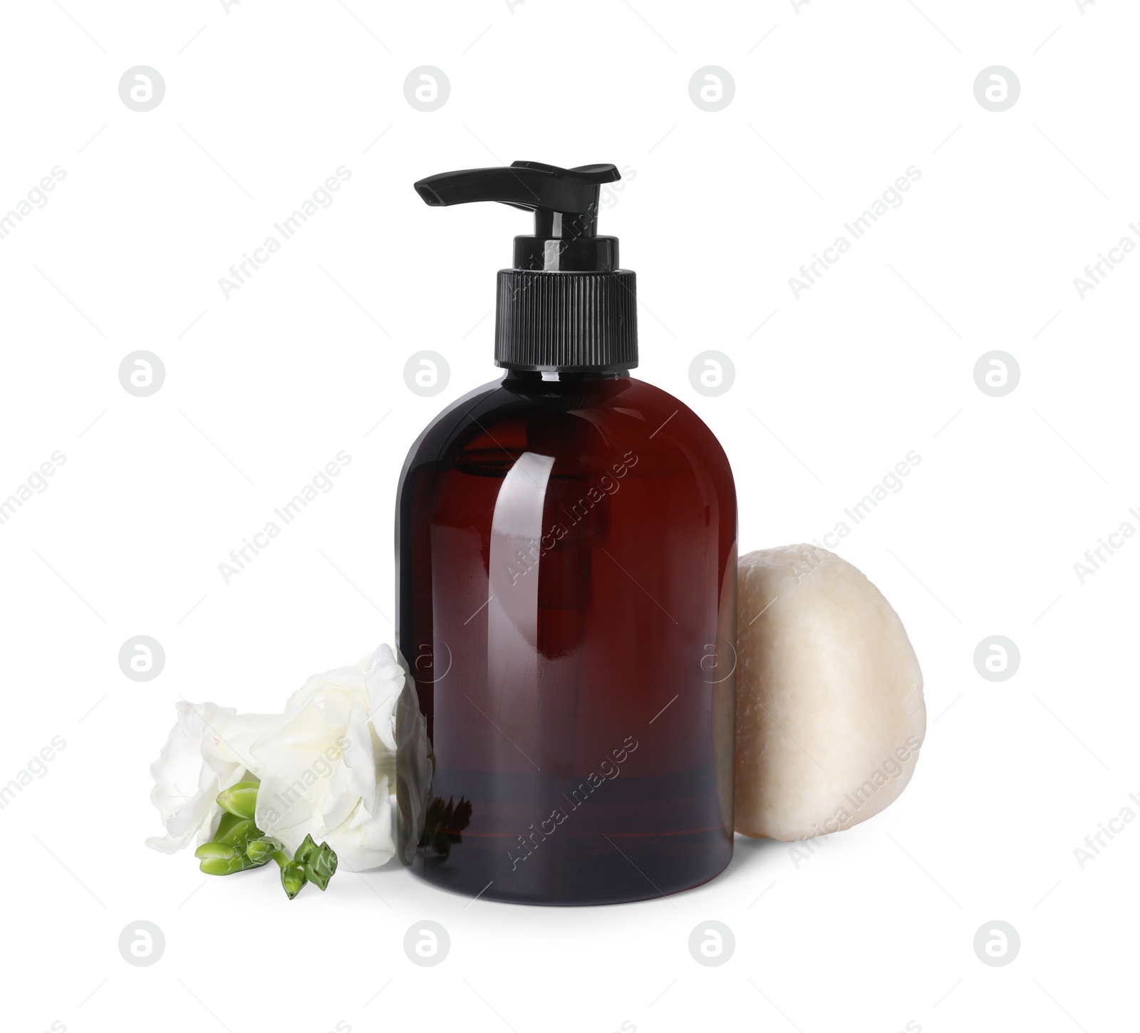 Photo of Solid shampoo bar and bottle of cosmetic product on white background