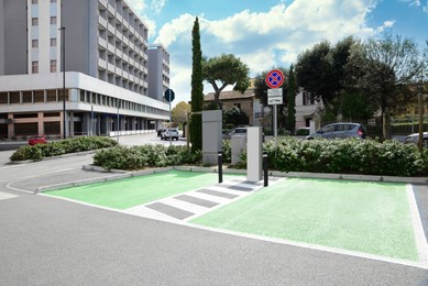 Photo of Electric vehicle charging station on city street