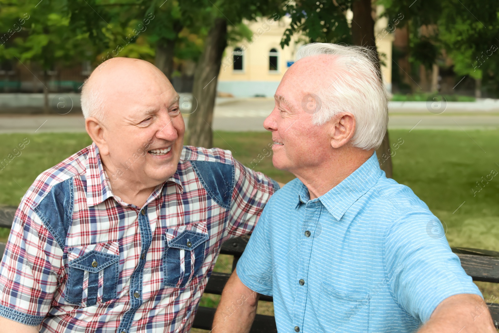 Photo of Elderly men spending time together in park