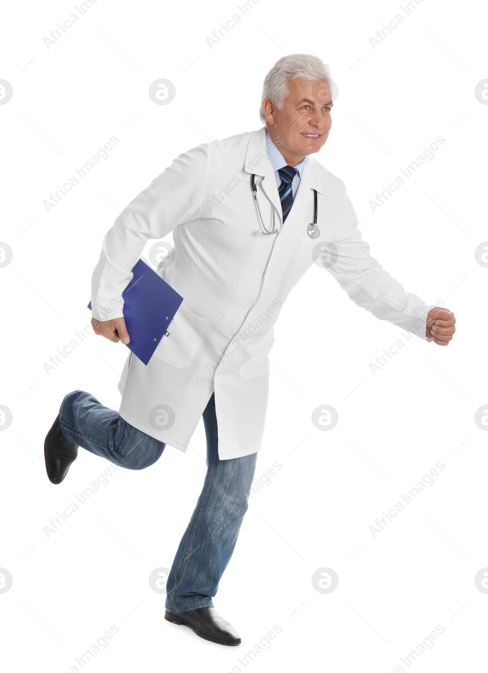 Photo of Senior doctor with clipboard running on white background