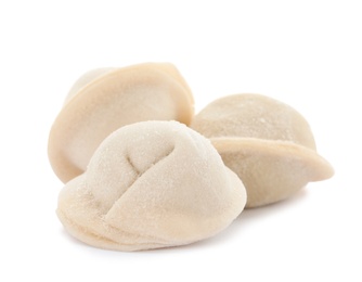 Raw dumplings with tasty filling on white background