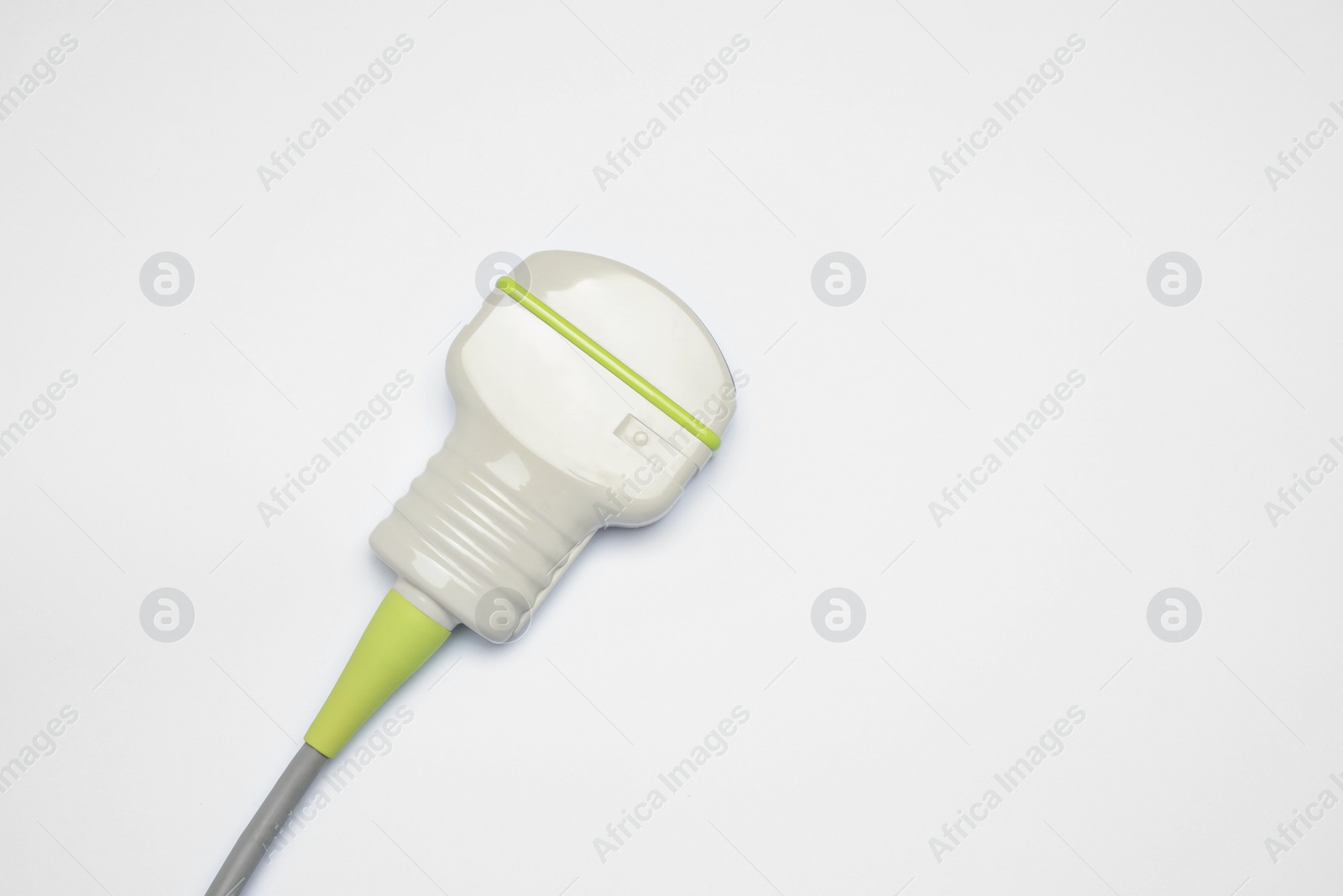 Photo of Ultrasonic transducer on light background, top view. Space for text