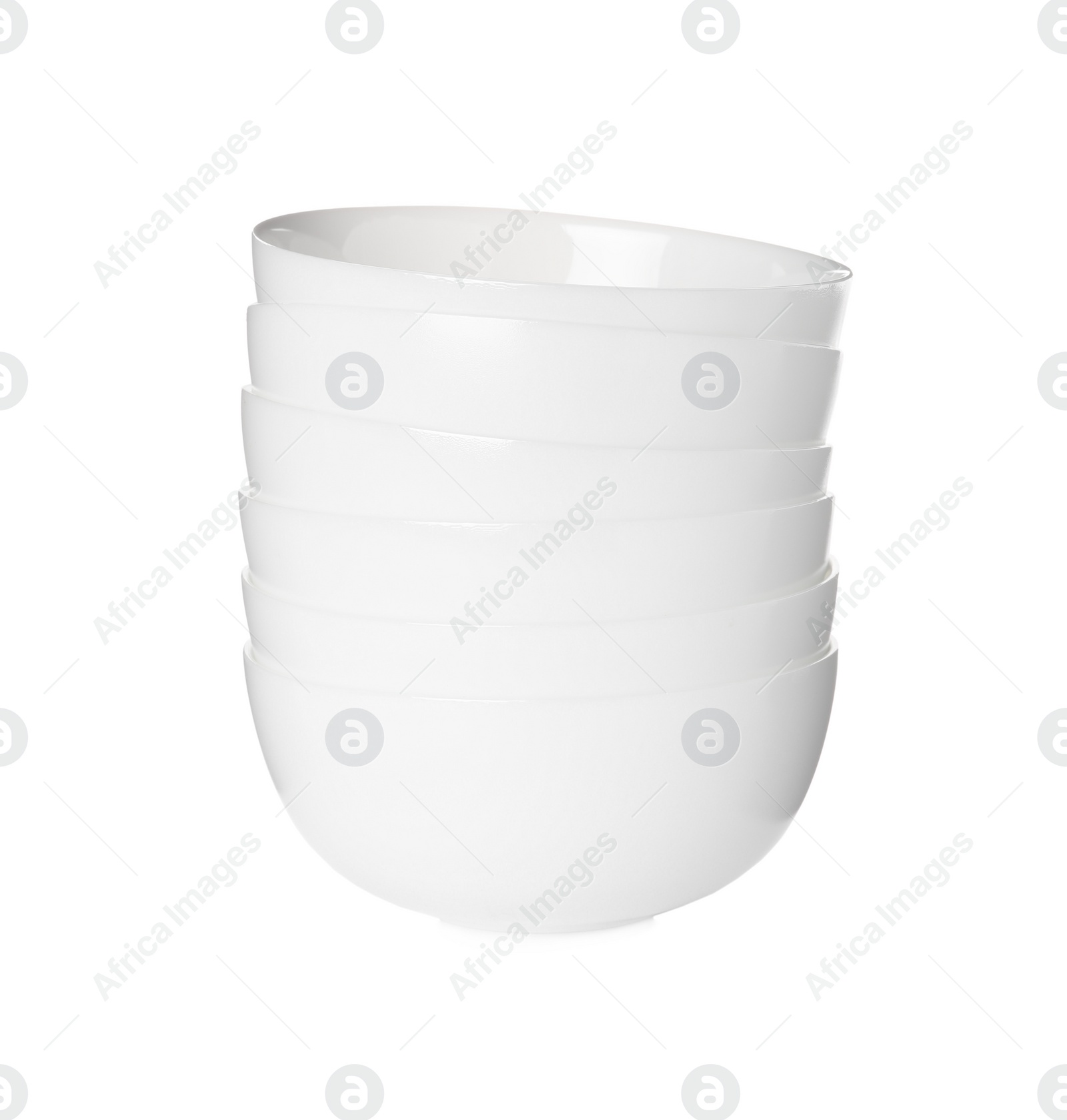 Photo of Stack of clean ceramic bowls isolated on white