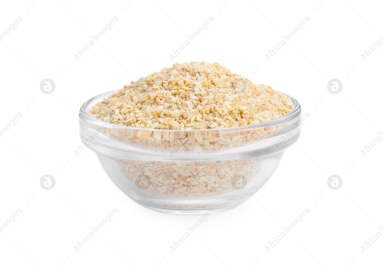 Photo of Dehydrated garlic granules in bowl isolated on white