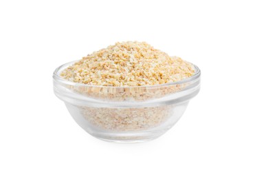 Dehydrated garlic granules in bowl isolated on white