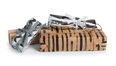 Photo of Heap of beautiful gift boxes on white background