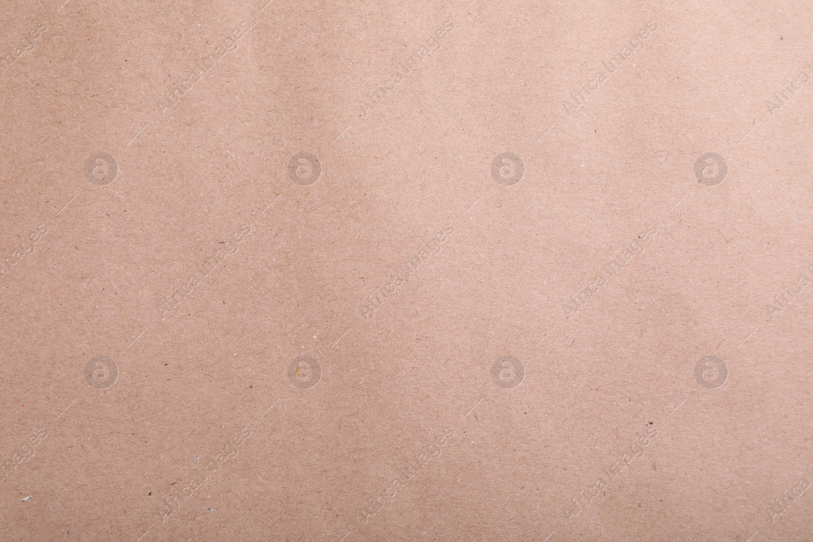 Photo of Texture of kraft paper bag as background, closeup