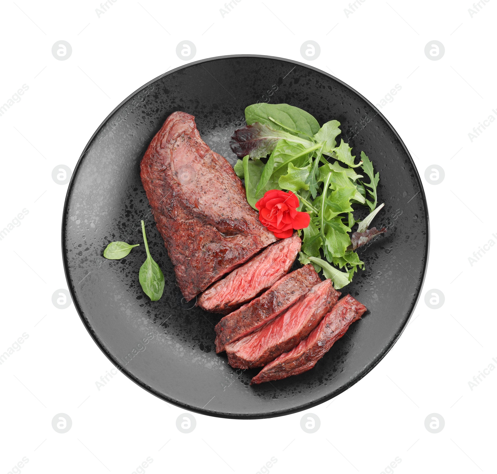 Photo of Pieces of delicious grilled beef meat and greens isolated on white, top view