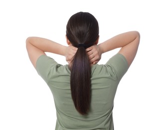Photo of Woman suffering from pain in neck on white background, back view. Arthritis symptom