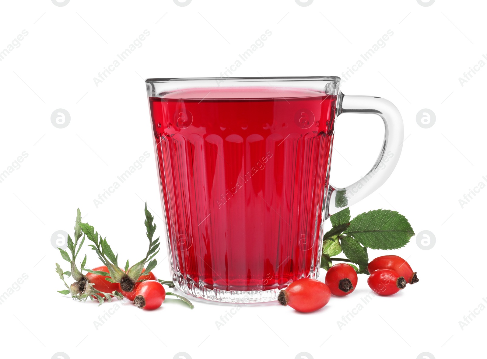 Photo of Aromatic rose hip tea and fresh berries on white background