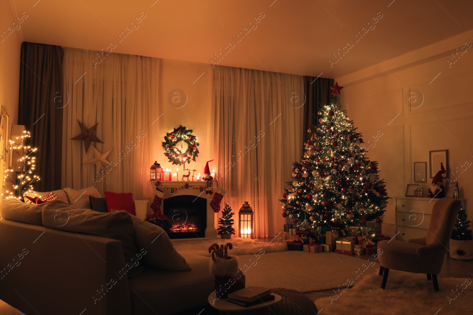 Photo of Festive living room interior with Christmas tree near fireplace