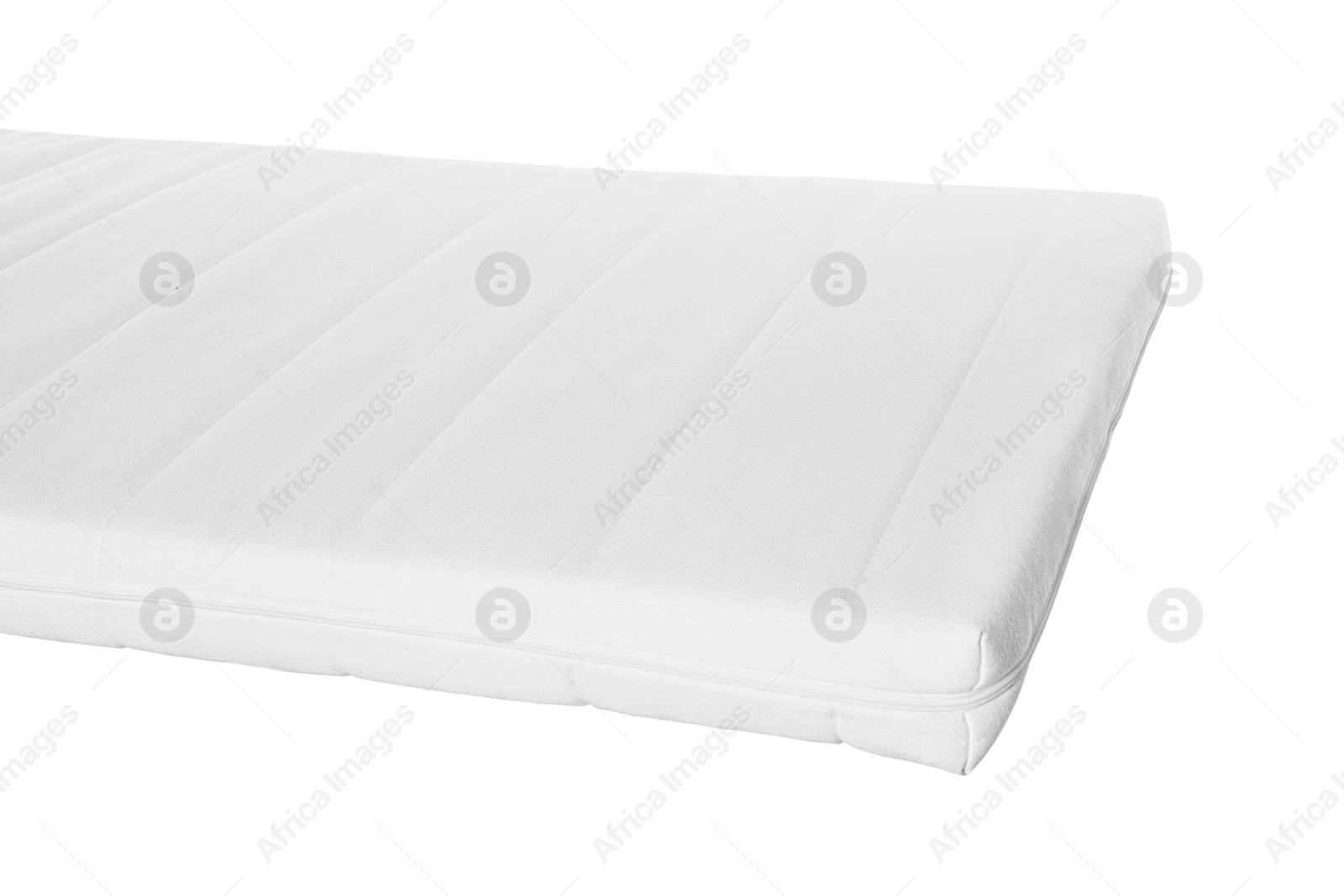Photo of One new comfortable mattress isolated on white, closeup
