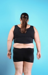 Photo of Overweight woman before weight loss on color background