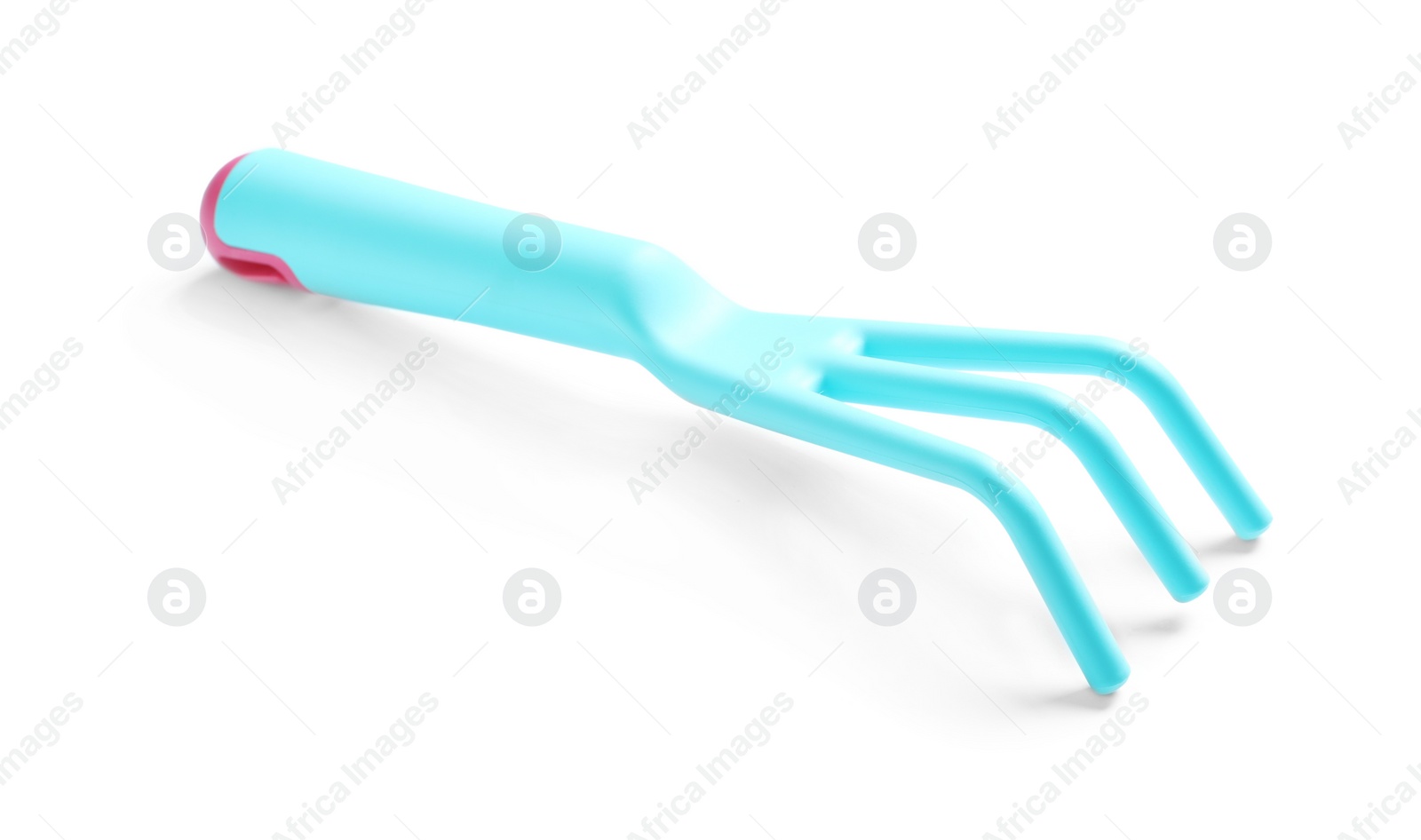 Photo of New rake on white background. Professional gardening tool