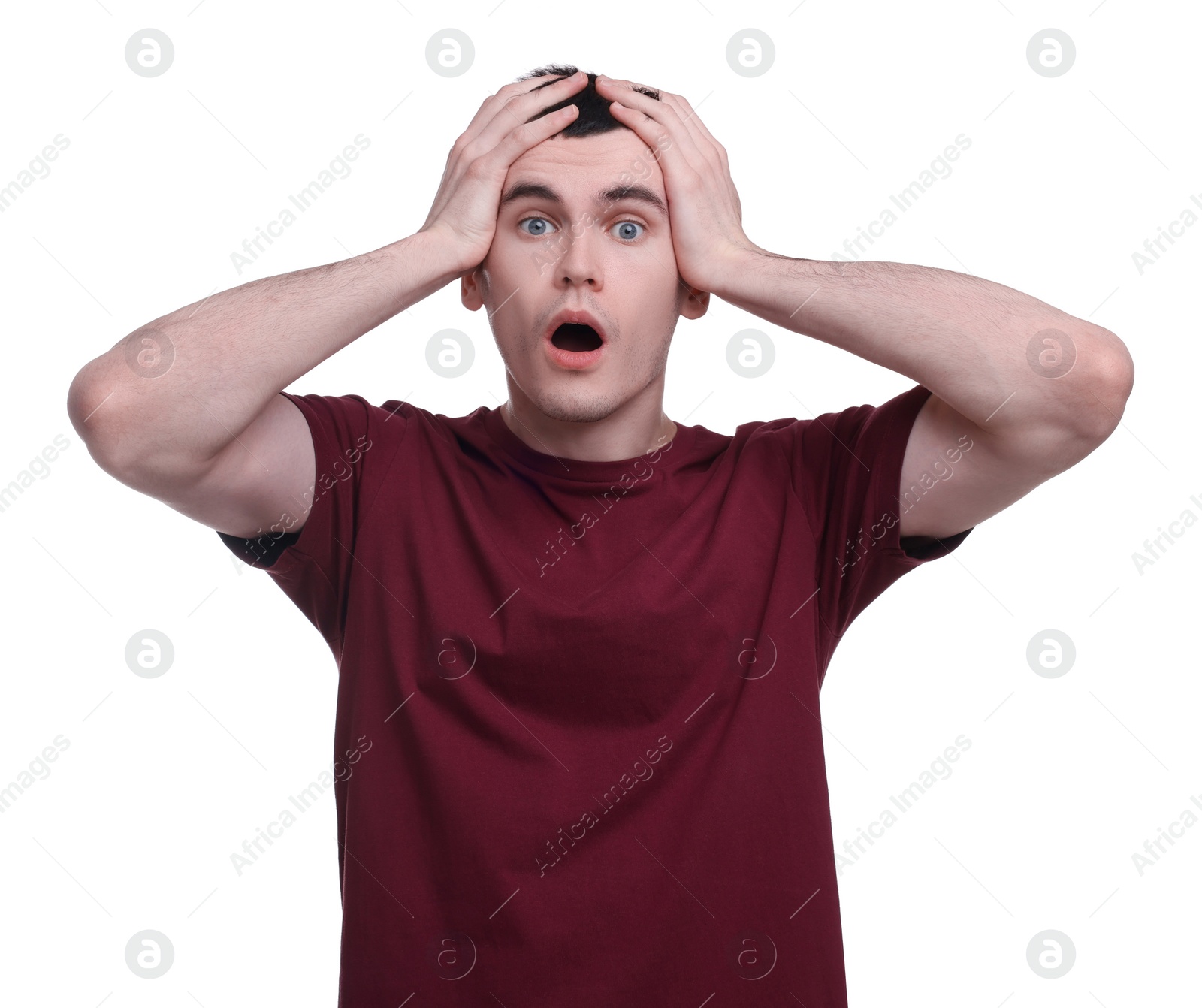 Photo of Portrait of surprised man on white background