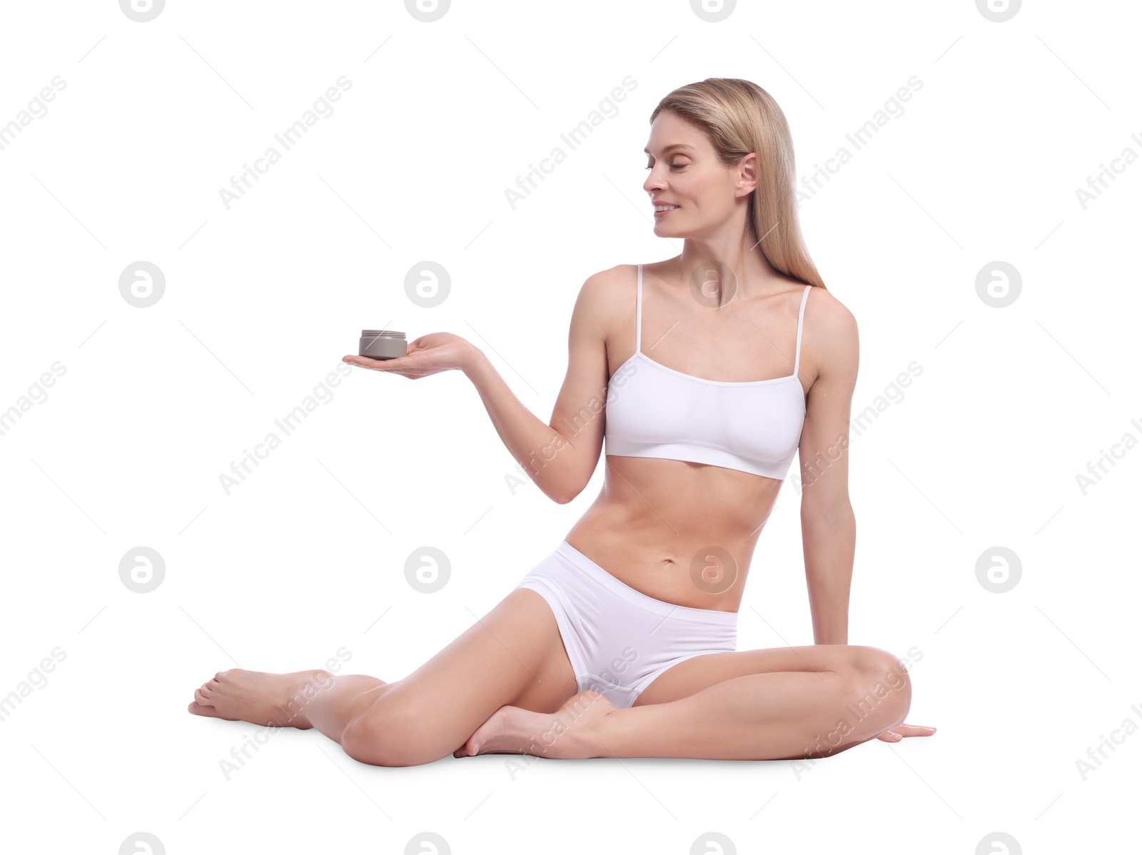 Photo of Woman with jar of body cream on white background