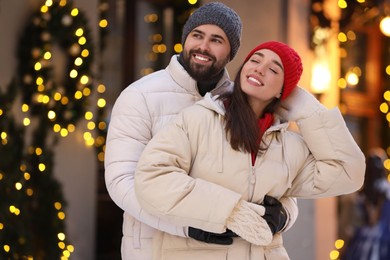 Lovely couple spending time together on city street