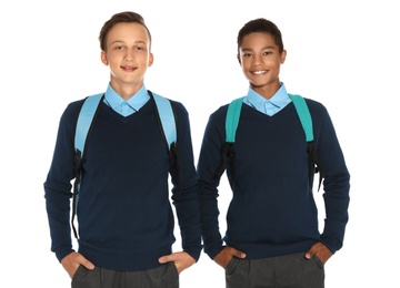 Teenagers in stylish school uniform on white background