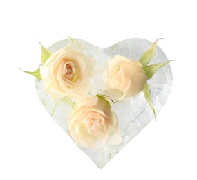 Photo of Heart shaped ice cube with roses on white background, top view