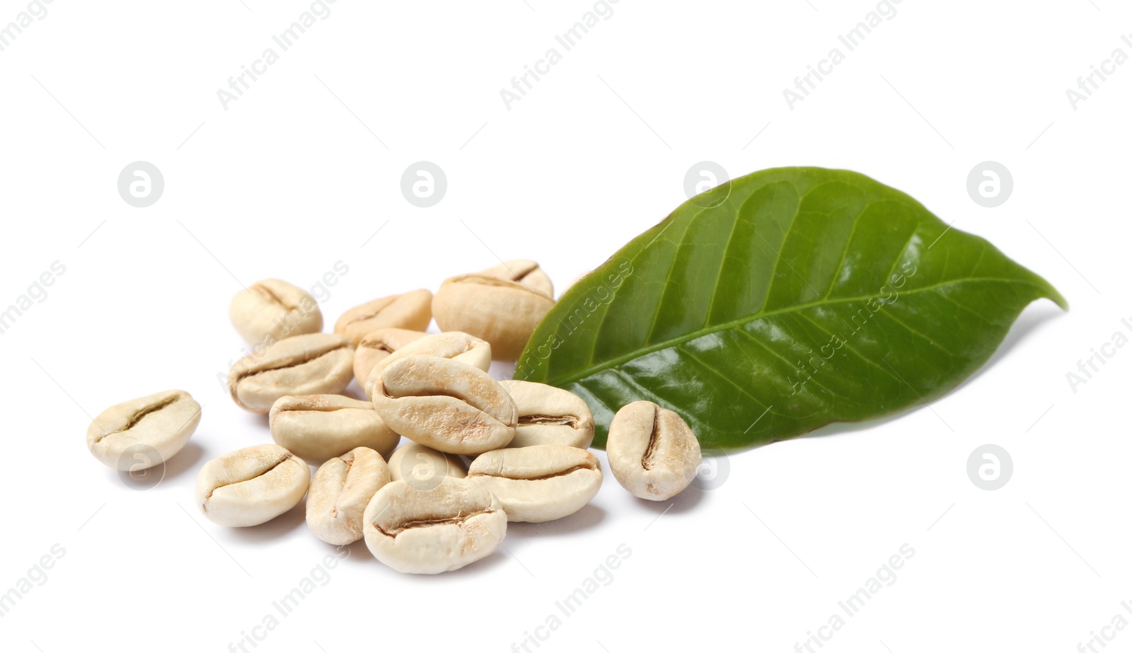 Photo of Green coffee beans and fresh leaf on white background